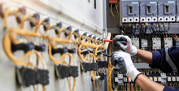 Professional Electrician technician working in Cordaville, MA